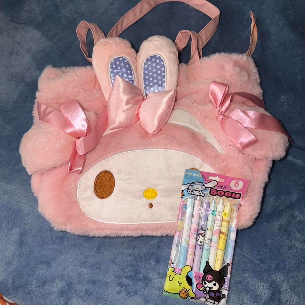 My Melody pink backpack with bow and ribbon details and pack of pens